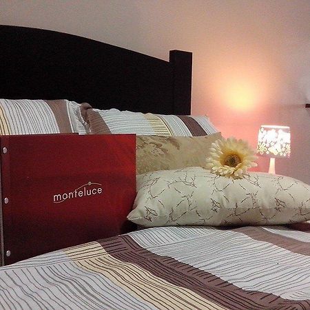 Monteluce Condominium Apartment Silang Phòng bức ảnh